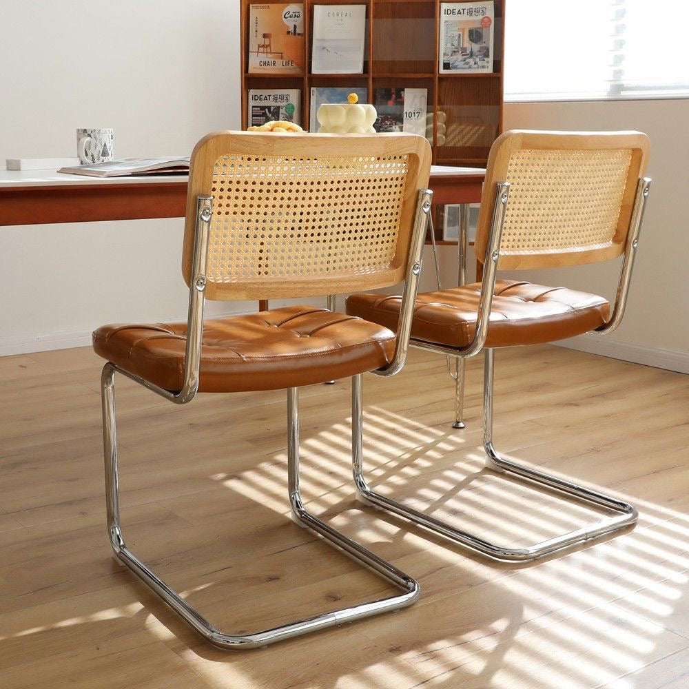 Rattan & Chrome — The Cantilever Dining Chair