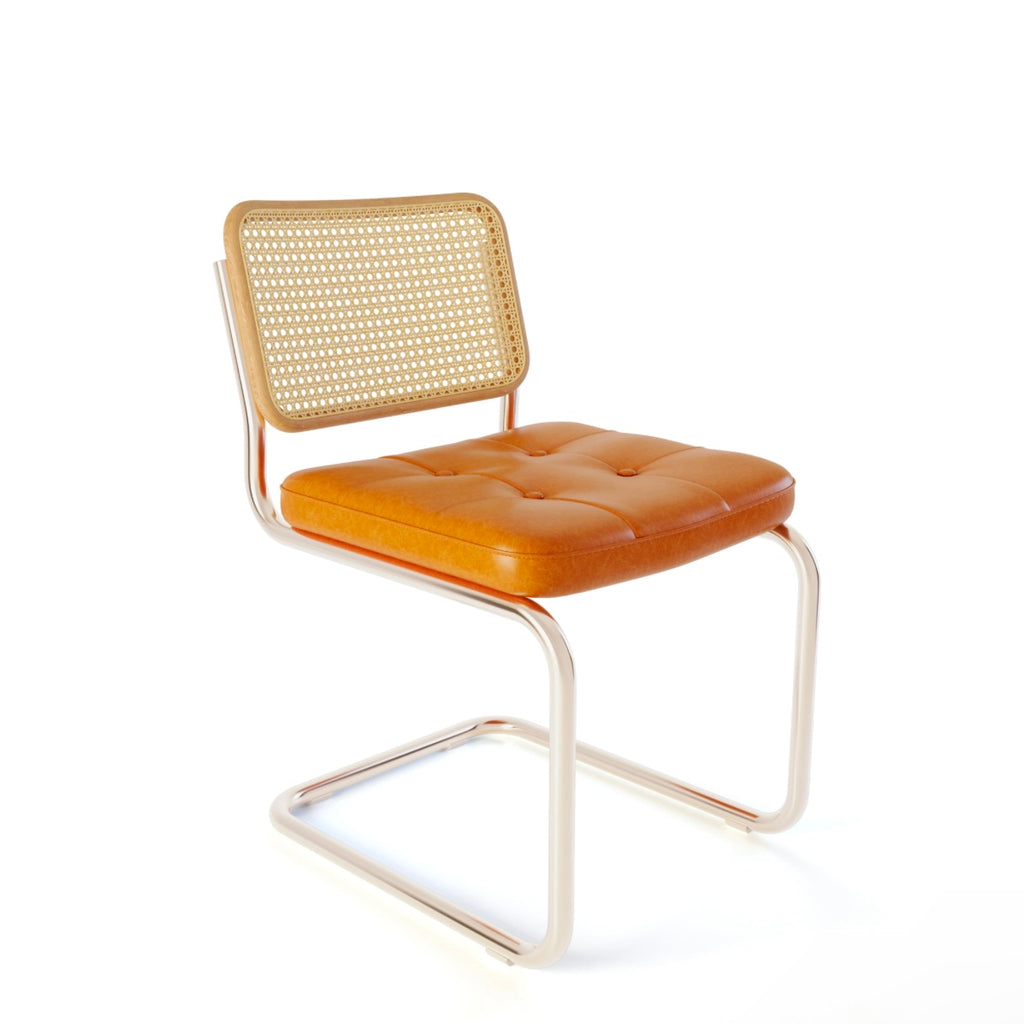 Rattan & Chrome — The Cantilever Dining Chair