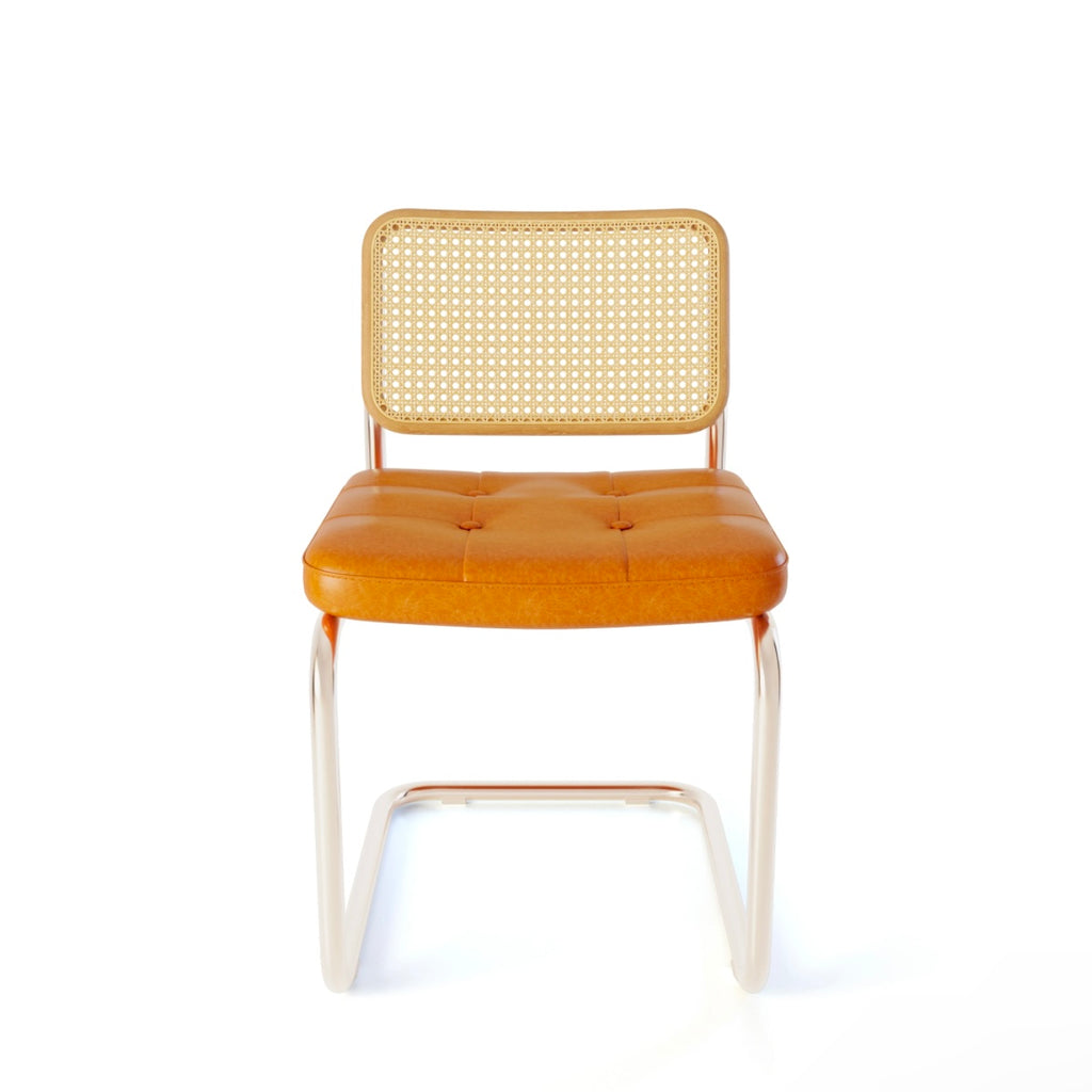 Rattan & Chrome — The Cantilever Dining Chair