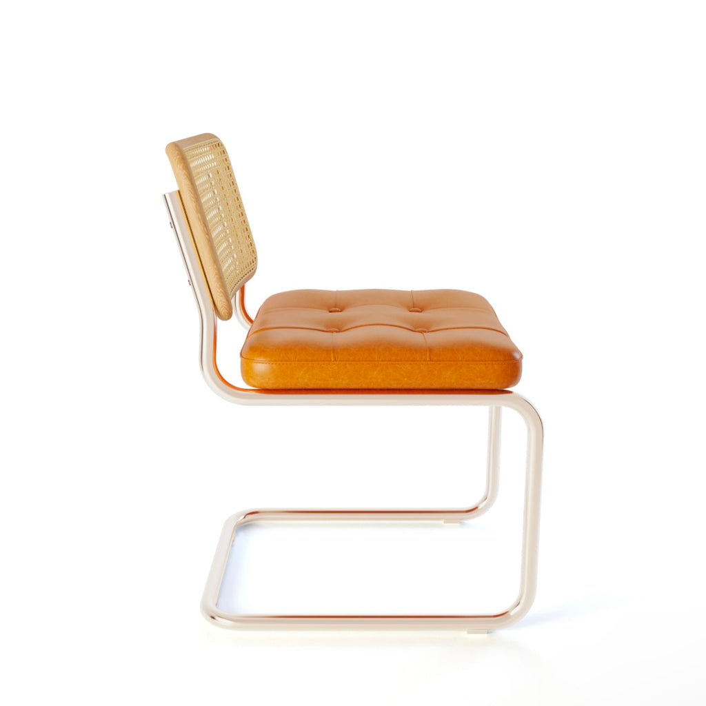 Rattan & Chrome — The Cantilever Dining Chair
